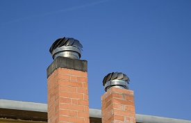 two brown brick chimney