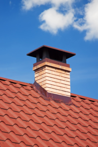Modern Ceramic Tile Roof with Chimney against the Sky